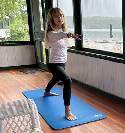 Shelley Kaiser practicing yoga. Shelley had spine surgery for spinal stenosis at Danbury Hospital.