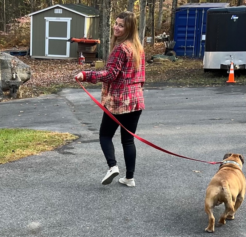 Karen Sullivan walking her dog about a month after surgery.