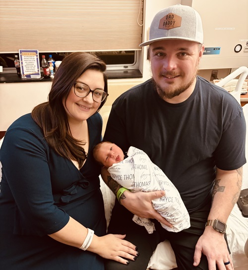 Samuel Neelands, Danbury Hospital spine surgery patient, with his wife, Ashley, and their newborn boy.