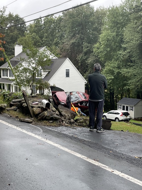 Danbury Hospital spine surgery patient Samuel Neelands’ car after the accident. It is crushed and on its side.