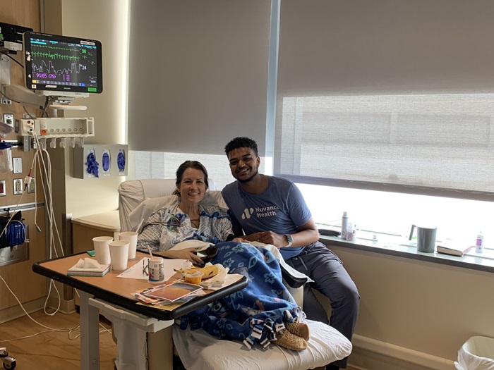 Amie Stearns, Danbury Hospital and New Milford Hospital stroke patient with Anthony “Winni” Sanchez, a patient care technician (PCT) at Danbury Hospital.