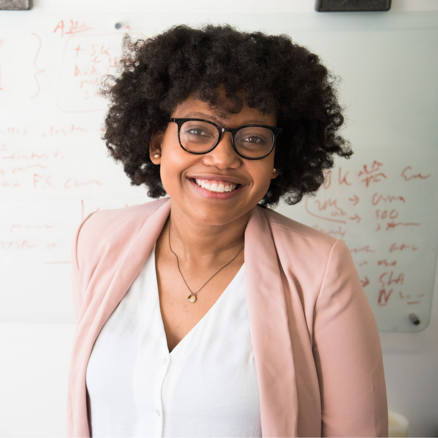 Portrait of woman wearing a pink blazer